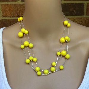 NWOT Yellow three strand necklace